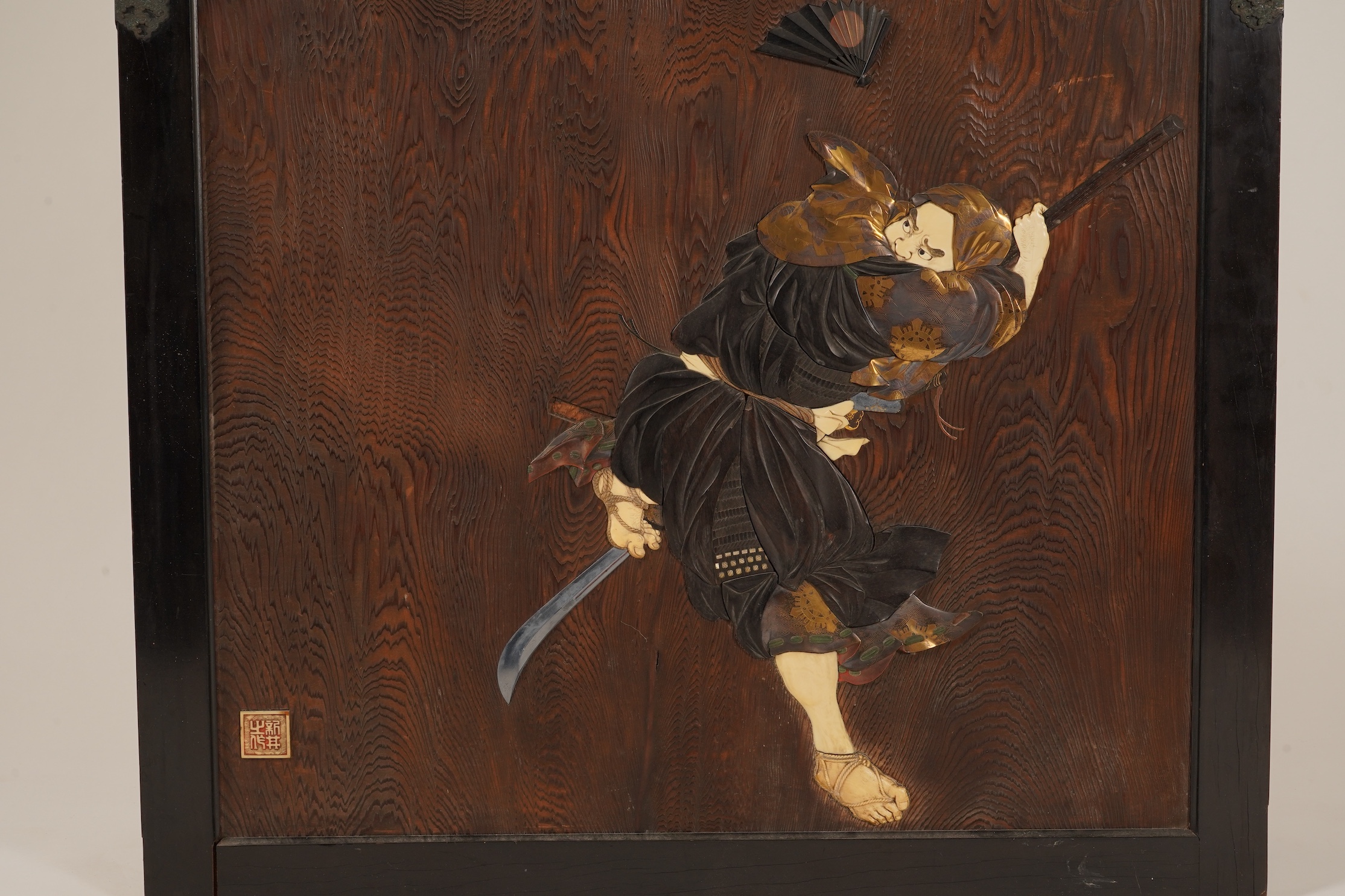 A Japanese inlaid persimmon wood tsuitate screen panel, Meiji period, possibly Tokyo School